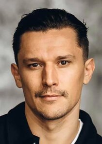 капитан Иван Коротченко, опер, напарник Ильи, хозяин Тайсона