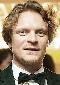 Джон, друг юности Милены, инвестор