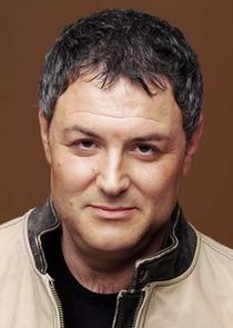 Дэн, друг Фила, гитарист