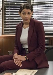 Detective Katriona "Kat" Azar Tamin